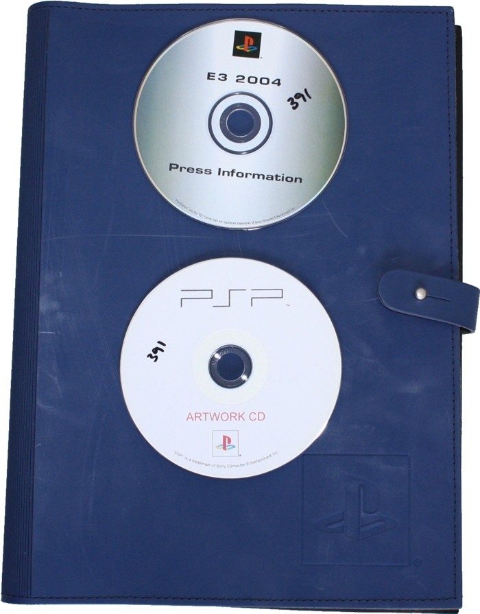 Front of leather folder with both discs on top