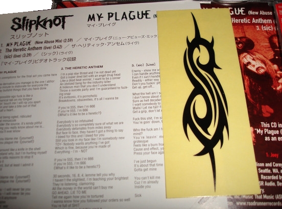 Lyrics sheet and sticker tattoo