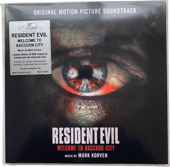 Front in plastic sleeve with sticker