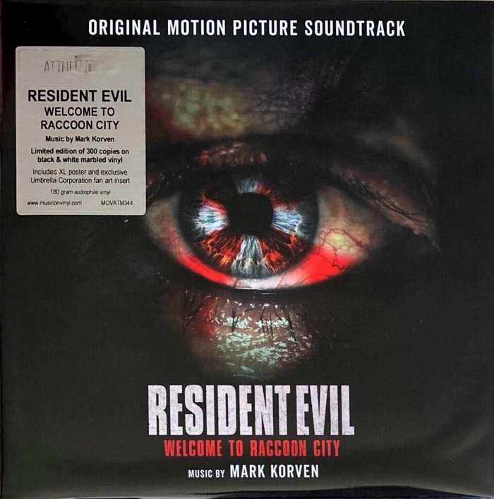 Front in plastic sleeve with sticker