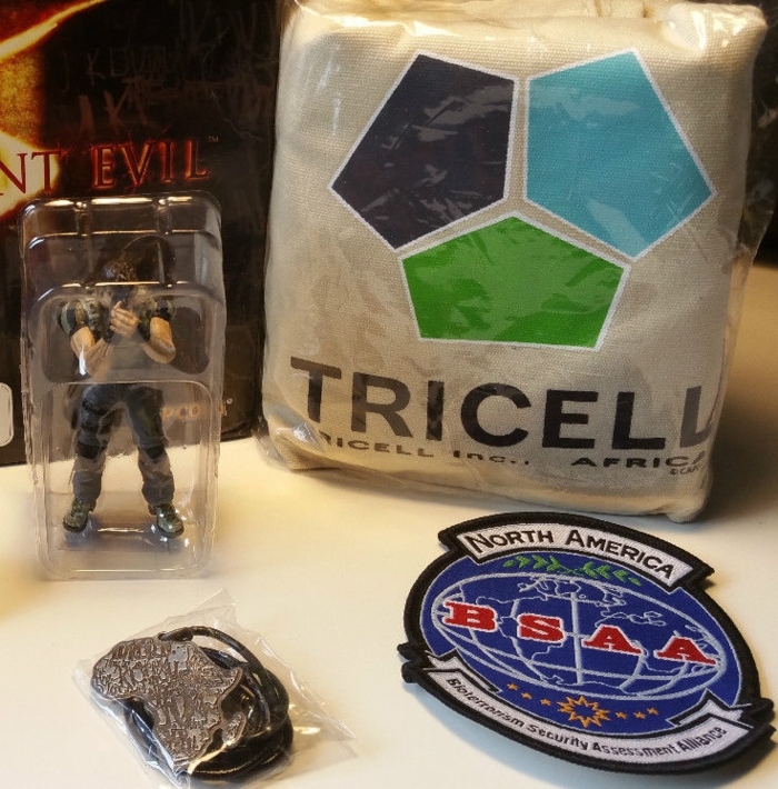 Figurine, bag, necklace, and patch