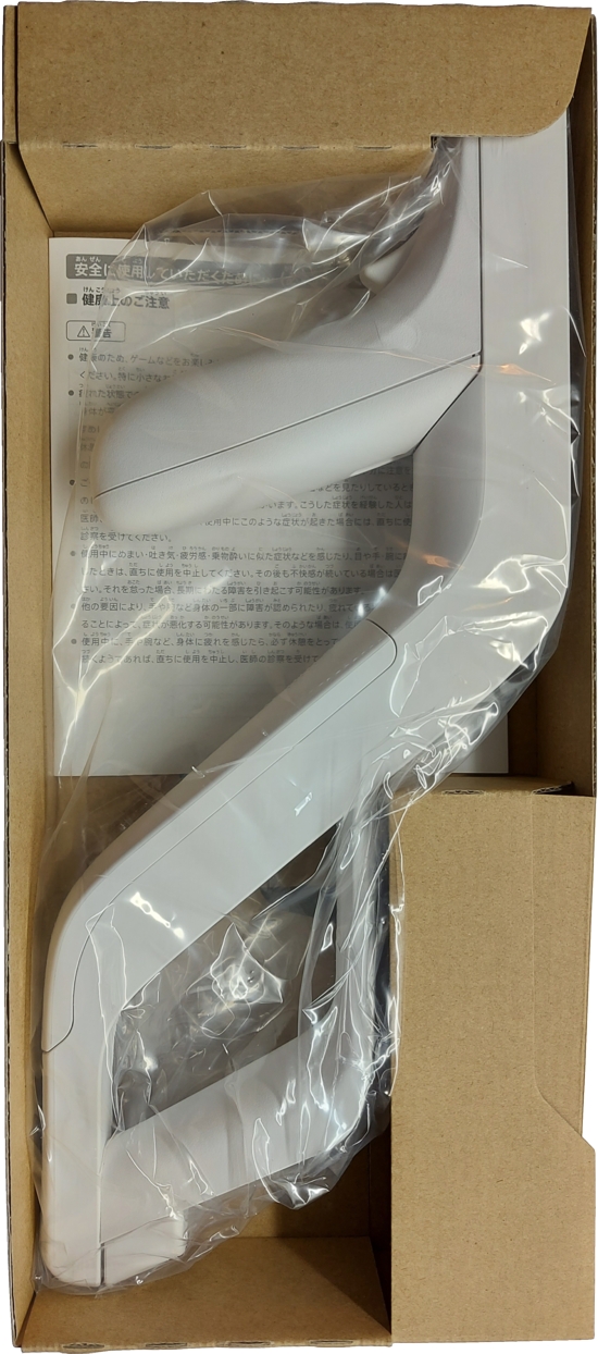 Inner box with Zapper and Zapper manual