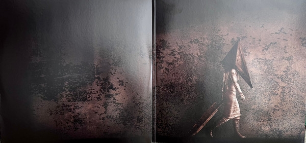 Inside gatefold sleeve Inside gatefold sleeve